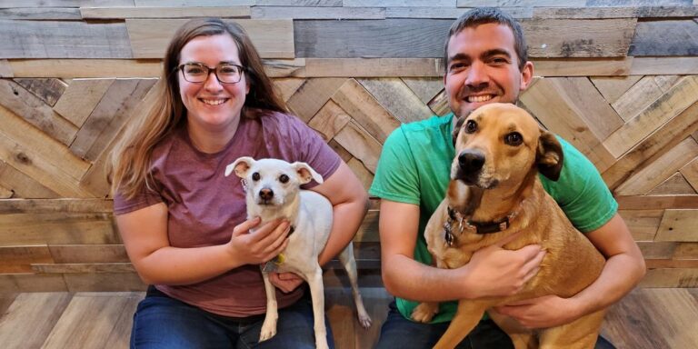 Nick with his wife Ally and two dogs